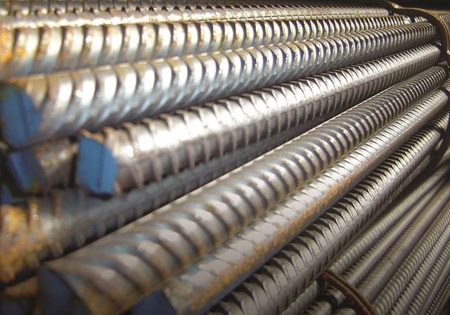 Bundled lengths of deformed reinforcing bar
